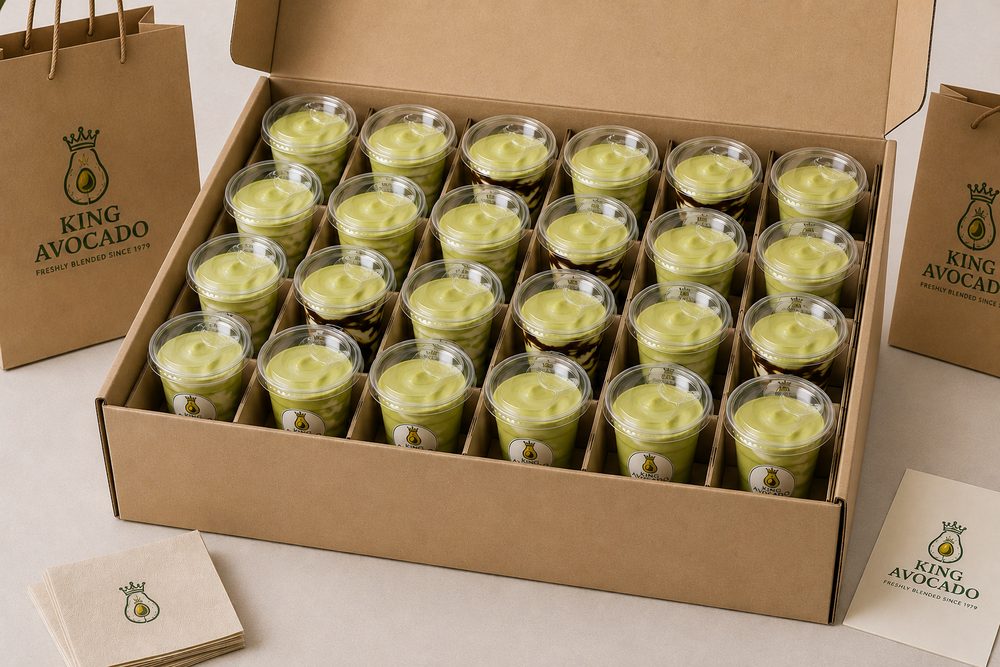 A gift box of freshly blended King Avocado drinks packed for corporate delivery